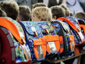 первоклашки рюкзак портфель школьники|Фото: