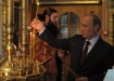 путин, свеча, храм, новороссия (2014) | Фото:пресс-служба Президента РФ